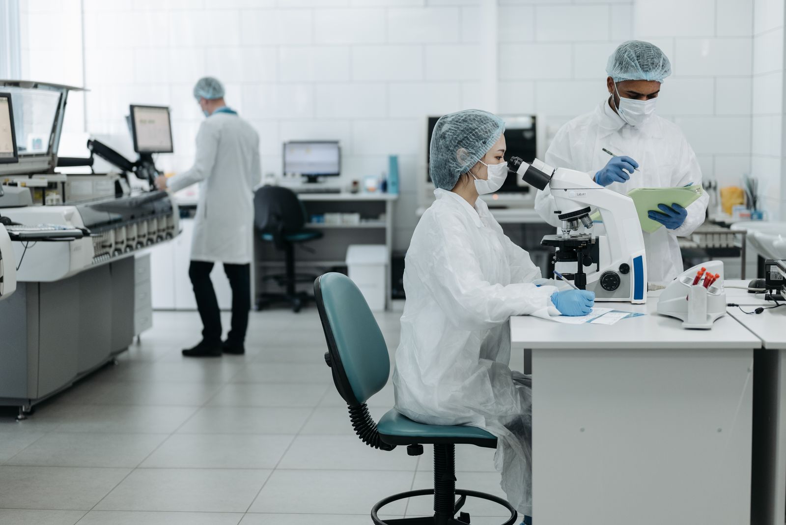 Healthcare science team working in a modern UK medical laboratory